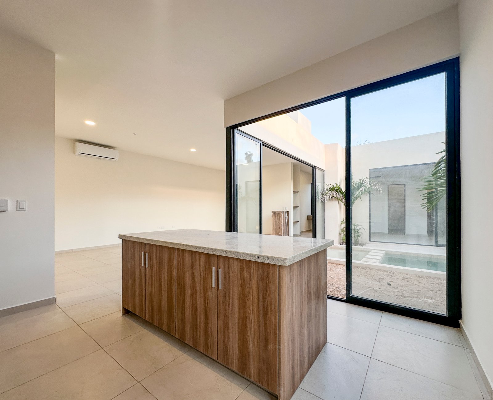 1806-52758-Casa-en-venta-de-un-piso-con-2-habitaciones-y-alberca-en-Naia-Residencial-Conkal_(14).jpg