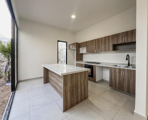 1806-52757-Casa-en-venta-de-un-piso-con-2-habitaciones-y-alberca-en-Naia-Residencial-Conkal_(13).jpg