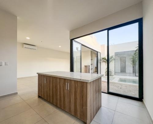 1806-52758-Casa-en-venta-de-un-piso-con-2-habitaciones-y-alberca-en-Naia-Residencial-Conkal_(14).jpg