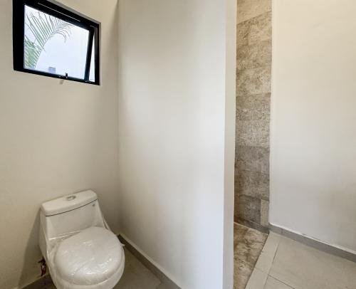 1806-52772-Casa-en-venta-de-un-piso-con-2-habitaciones-y-alberca-en-Naia-Residencial-Conkal_(28).jpg