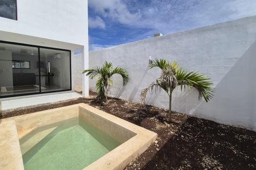 1834-50835-Casa-en-Venta-en-Gran-San-Pedro-Cholul-coN-habitación-en-planta-baja-y-alberca_(13).jpg