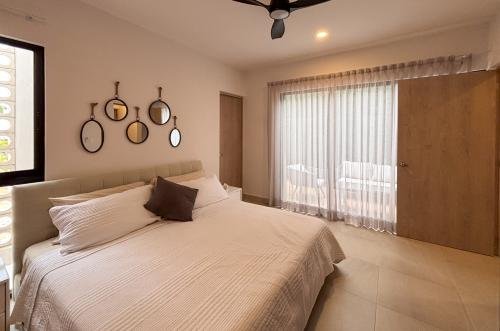 2029-54799-Casa_estilo-Townhouse-en-venta-en-cholul-al-norte-de-Merida-THULA-CITY-HOME__(18).jpg