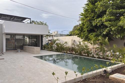 2029-54821-Casa_estilo-Townhouse-en-venta-en-cholul-al-norte-de-Merida-THULA-CITY-HOME__(40).jpg